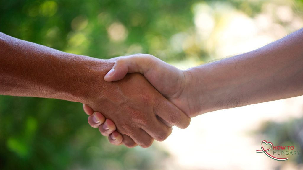 Hungarian greeting with a handshake