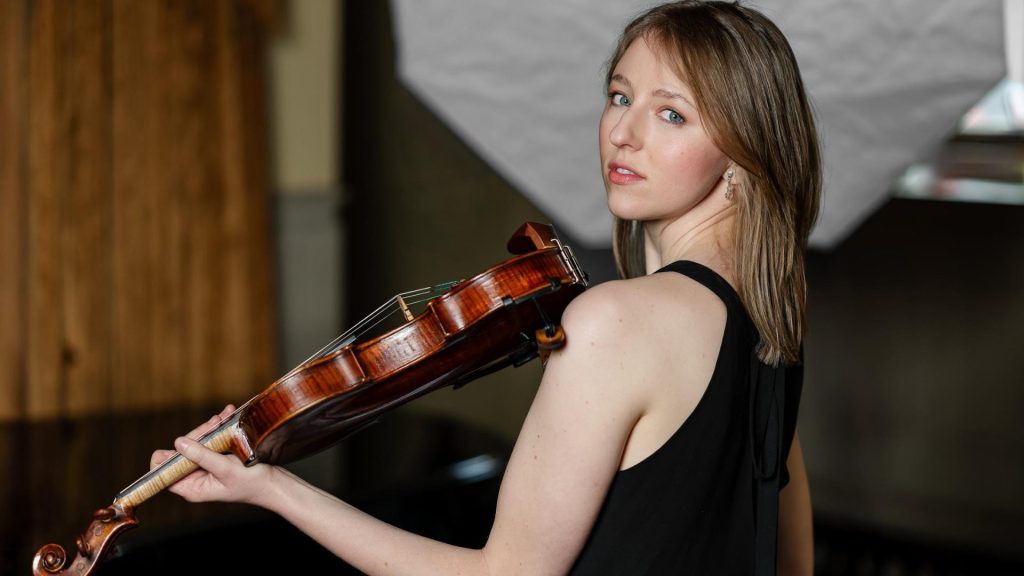 Violinist Karolina Csáthy with violin, performing classical music in Budapest — Mendelssohn Reimagined, June 2026